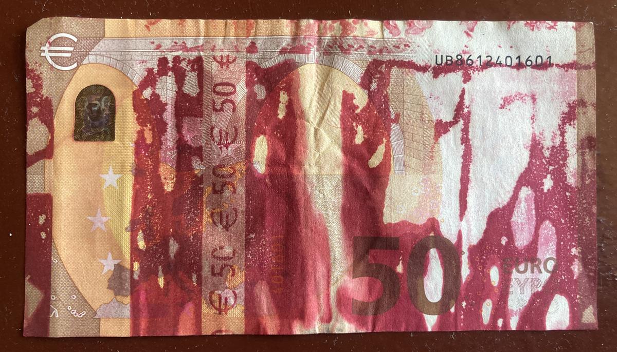 euro banknotes cafe table